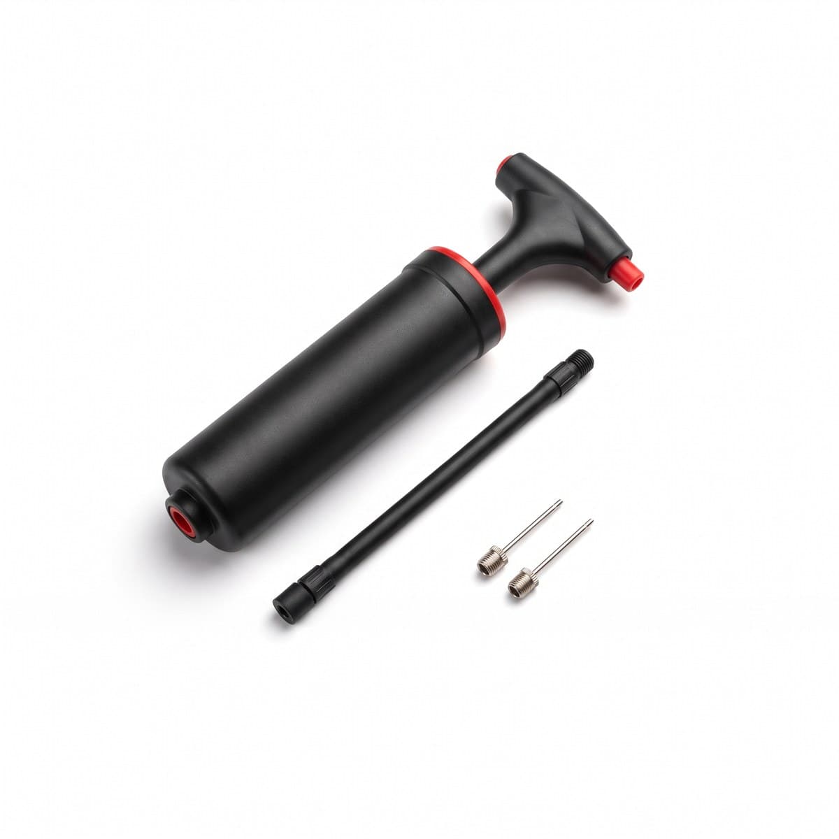A black and red hand ball pump with a short black hose, two metal inflation needles beside it
