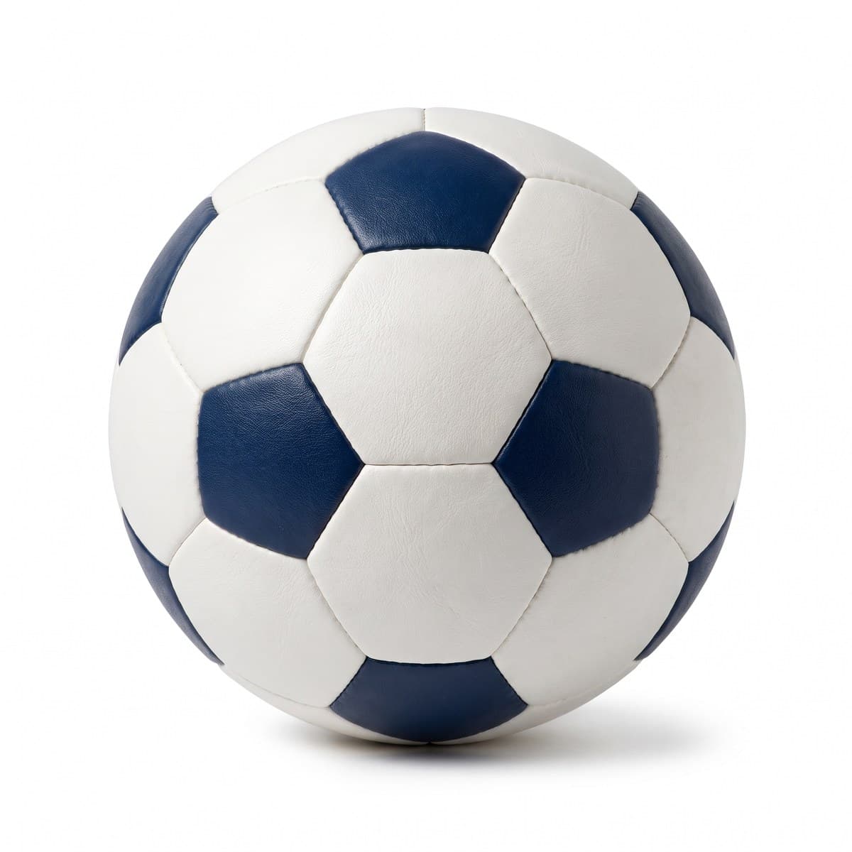 A soccer ball with white and navy blue panels